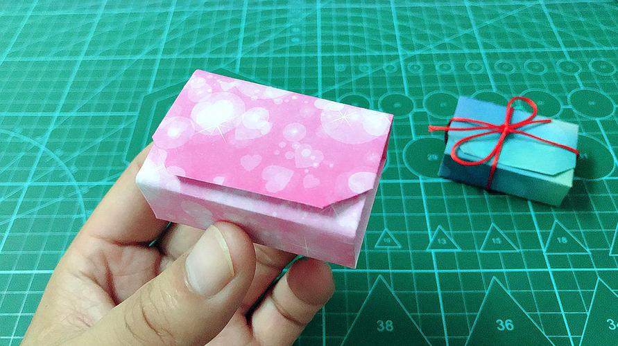 不用粘不用剪一张纸折个漂亮的礼物盒手工折纸视频