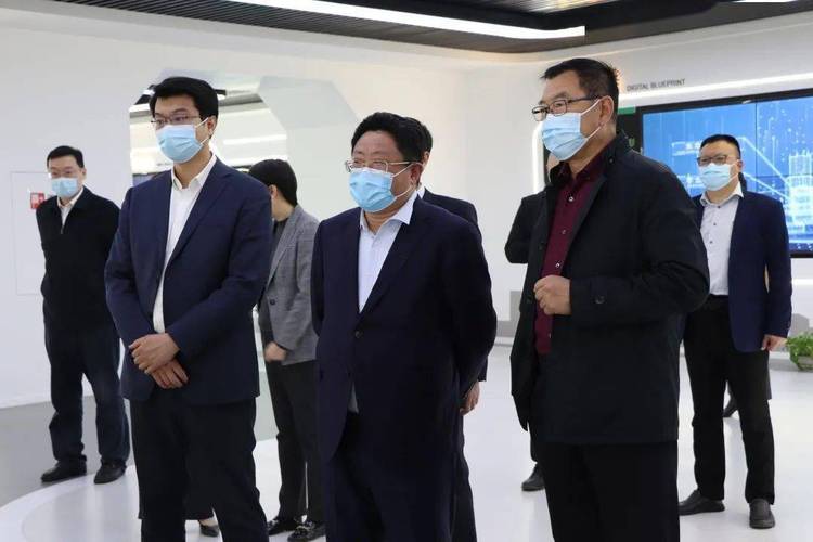 青岛市民营经济发展局局长郭振栋一行到文达通股份督导