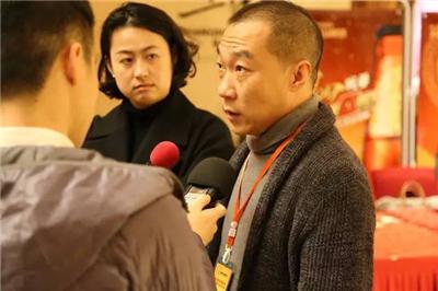 潜江烹饪酒店行业协会会长,中国潜江龙虾职业学院董事长张国安接受