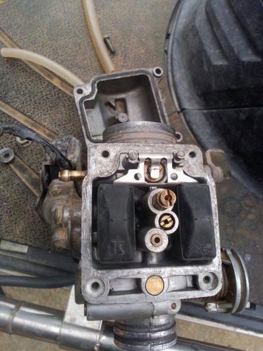 这个化油器的油面高底怎么调?