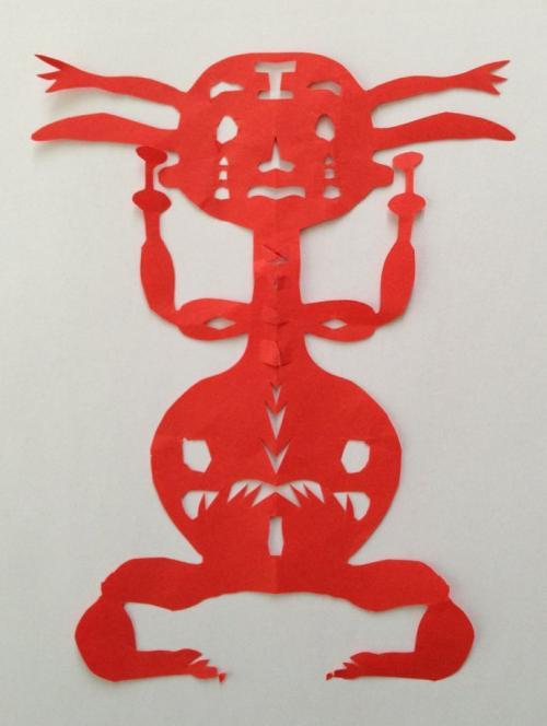 抓髻娃娃剪纸图片对称画法