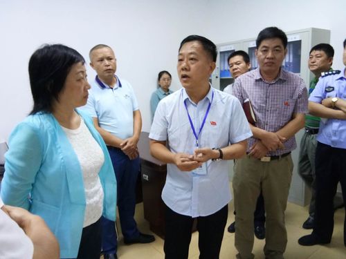 市委副书记周廉芬同志,市司法局金韬局长,市公安局副局长周有武同志与