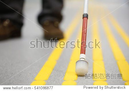 blind pedestrian walking and detecting markings on tactile
