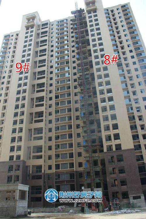 九龙湾3月份工程进展 正在进行门窗安装_荆州好房子网资讯