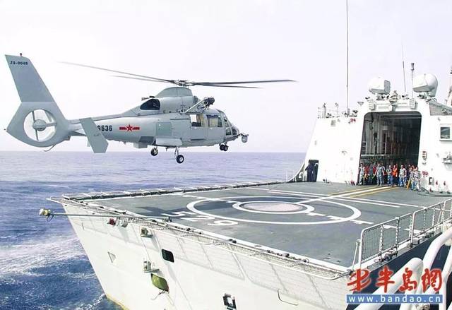 而这一长度已可满足我海军最强大的直18舰载反潜直升机上舰的需要