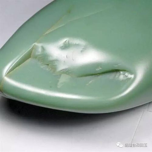 玉器知识    沙枣青——   沙枣青是和田青玉籽料中的一个少见品种