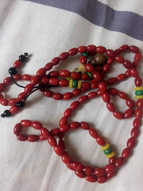 请问这串红珊瑚是真是假?谢谢