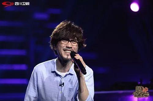 周传雄:浴火重生,笑看过往