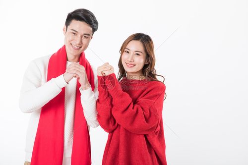 照片 人物情感 新年好 年轻情侣拜年动作.