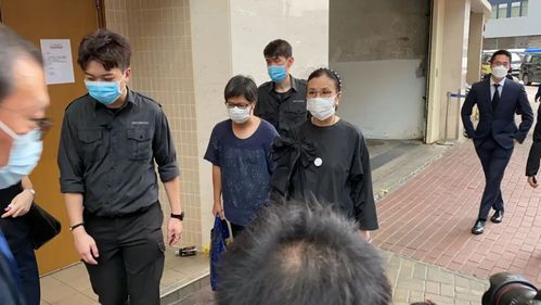 还有郭炳江的儿子郭基辉,就是远远站在阿姐汪明荃后面的那位"交叉