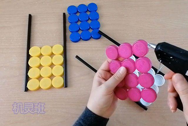 儿童环保手工:废物利用塑料瓶盖自制插花瓶(步骤图解)