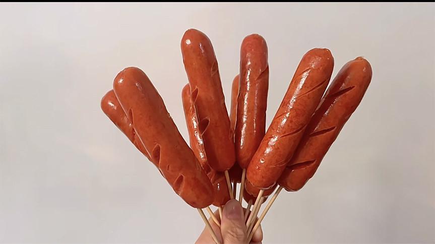 最近抖音上很火的"十根烤肠"到底是什么梗?