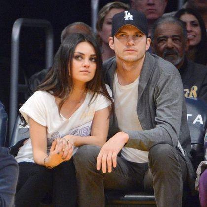 阿什顿·库彻与妻子(资料图)