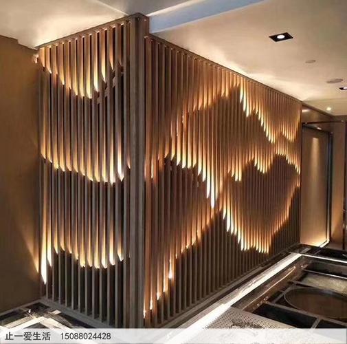 一,不锈钢镂空的山水造型屏风背景墙.
