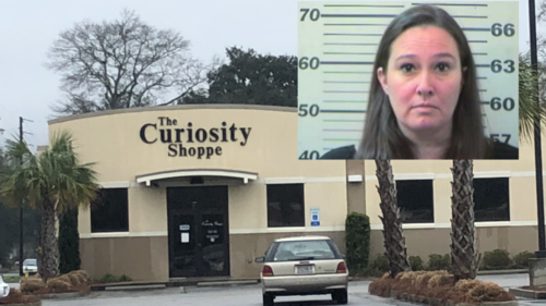 charges: over $100,000 embezzled from a mobile catholic