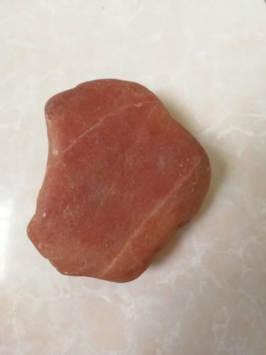 这块是杜热红石,也叫红色戈壁玉,新疆富蕴县杜热乡的特产.