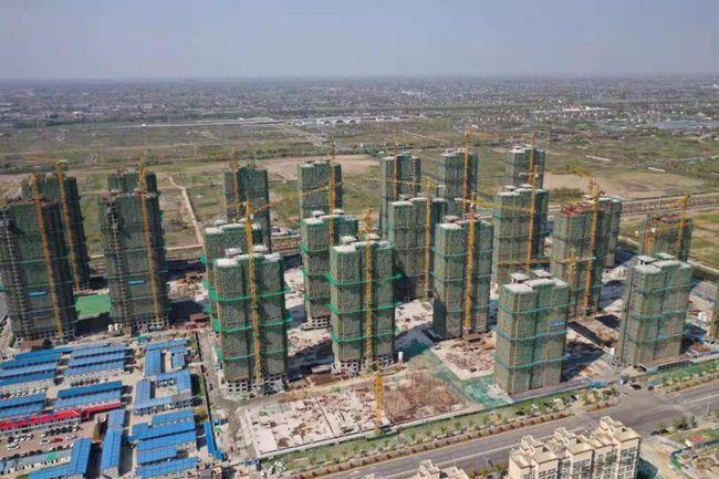 最新进展海门北部新城都市五星北区22幢安置楼全部封顶