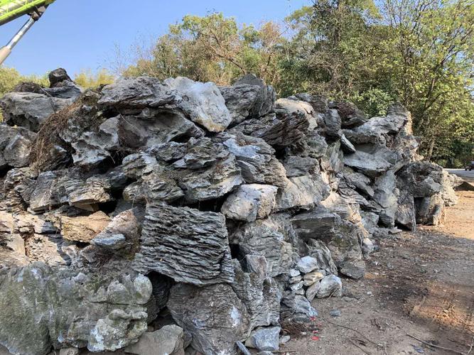 家庭式假山奇石水池驳岸园林景观石公园小区流水瀑布石黄蜡石