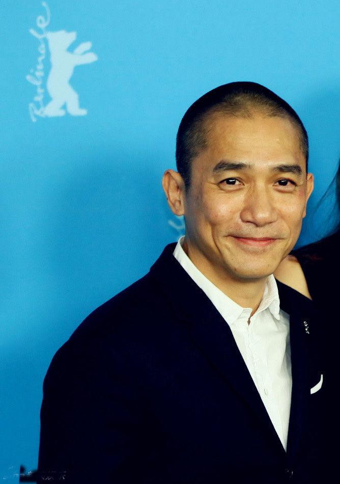 梁朝伟柏林电影节当评委 圆寸呆萌亮相发布会(图)