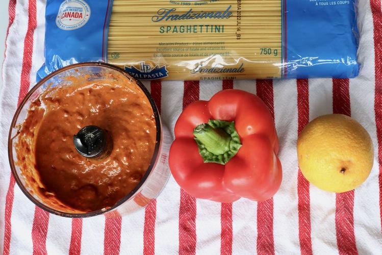 pasta features a spicy north africa paste, red bell pepper and