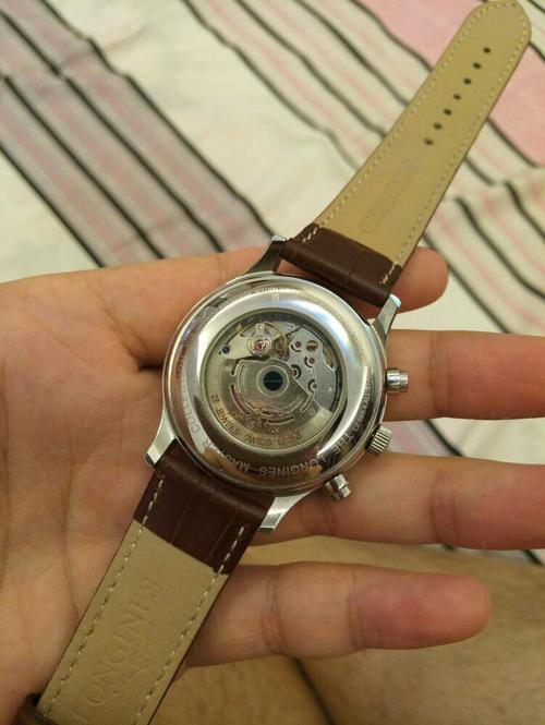 这块浪琴表是真是假?玻璃被我摔坏了,我在考虑要不要拿去修修!