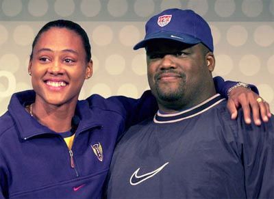 "女人祸水论"逆转 三个男人害苦女飞人琼斯[图]