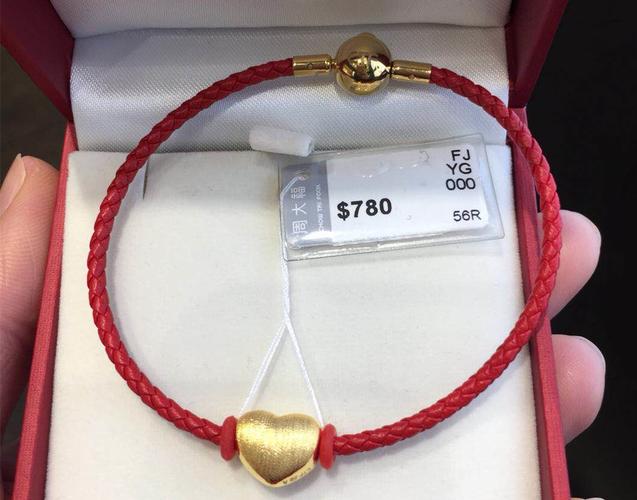 热卖香港周大福转运珠皮绳手链黄金串珠女迷你生肖猪999足金大小金猪