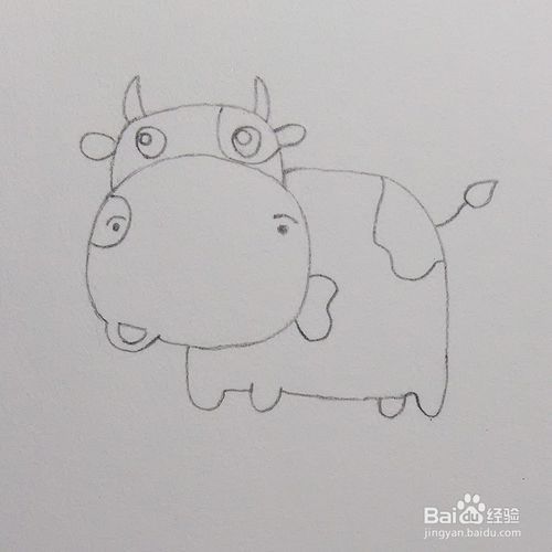 1 用铅笔画出草图,先画出奶牛的头部,注意将嘴巴向左偏.