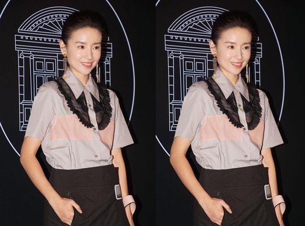董洁的造型频频翻车穿衬衫配透光裙腿上的白色长筒袜更是晃眼