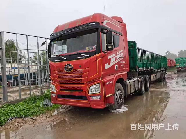 20年解放jh6牵引车带13米高低板花篮半挂车