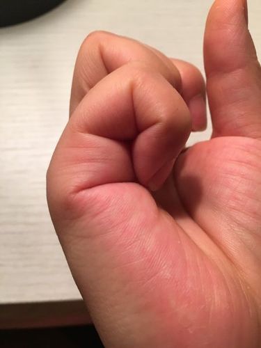 帮忙看一下,看手相会生几个孩子?