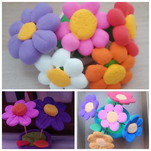 不一会儿,彩泥在孩子们的手中渐渐有了模样,一朵朵绽放的花朵诞生啦