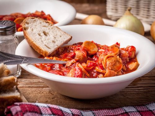 a blend of green pepper, red onion, tomato and lots of spicy