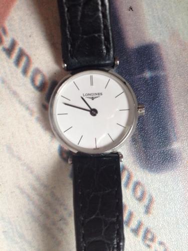 浪琴l46352,28137858,几年前朋友送的,不知道是真的假的,麻烦大家帮我