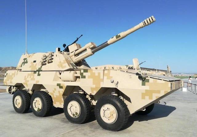 图为我军09式122毫米轮式自行榴弹炮