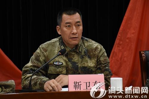 市委常委,军分区司令员靳卫东出席会议.