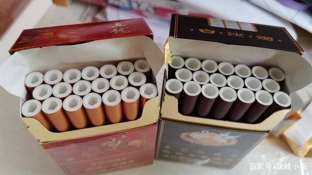 小伙无聊拿湖南,广西,两款烟嘴有洞洞的香烟来闲聊作