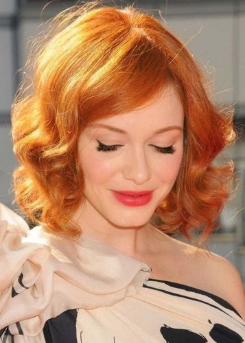 flaming red hair with slithered ends and flips.