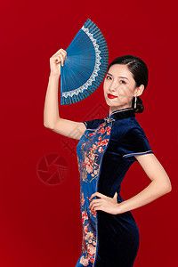旗袍背面中国风旗袍美女拿扇子背景