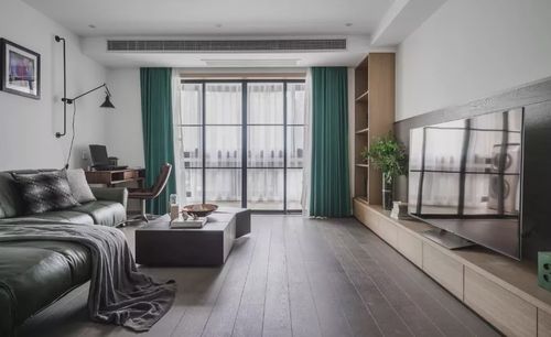 现代风的客厅是比较流行的,大白墙和木质电视柜,皮艺沙发结合起来