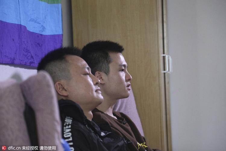 home a day before going to court to argue in china"s first gay
