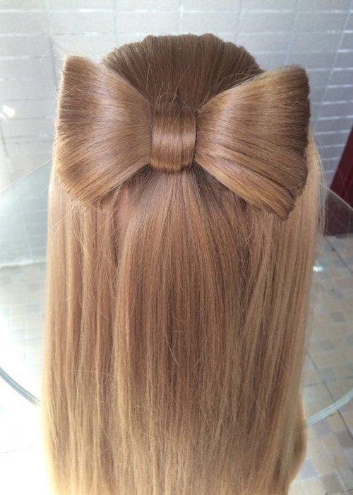 长头发扎辫甜美发型超级迷人完整的蝴蝶结辫,两侧头发是以协调作用