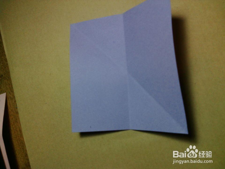 如图,将正方形纸对折,变成长方形.