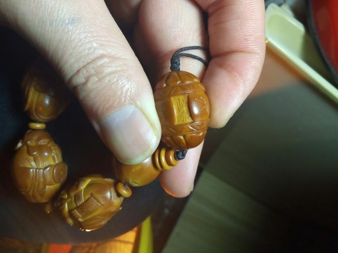 橄榄核手串是谁的落款