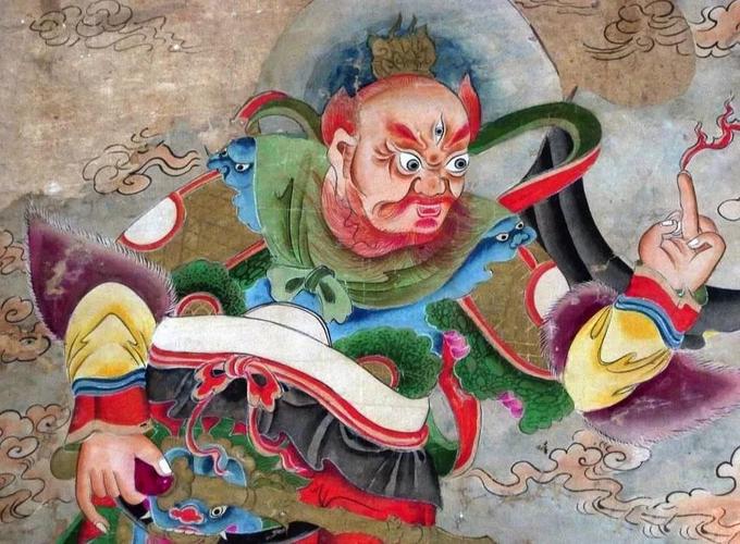 左手竖起中指,是在行使召唤灵官神将,驱邪伏魔的灵官诀.