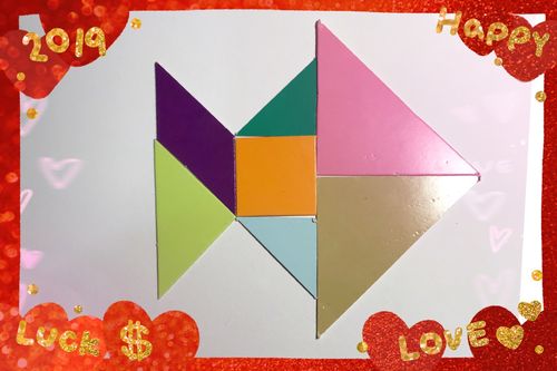 我用七巧板拼一条鱼,大家年年有鱼