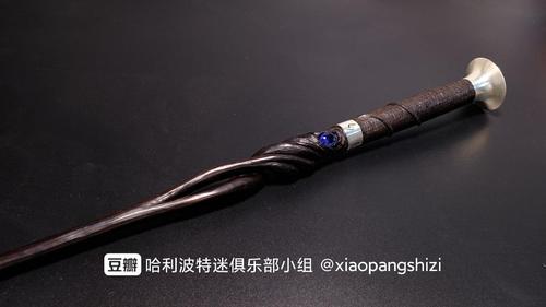 "黑檀木,13又1/2英寸,凤凰羽毛核心,令人意想不到的坚韧!