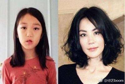 照片中母女俩同穿厚重羽绒外套,王菲面带微笑心情看起来很不错.