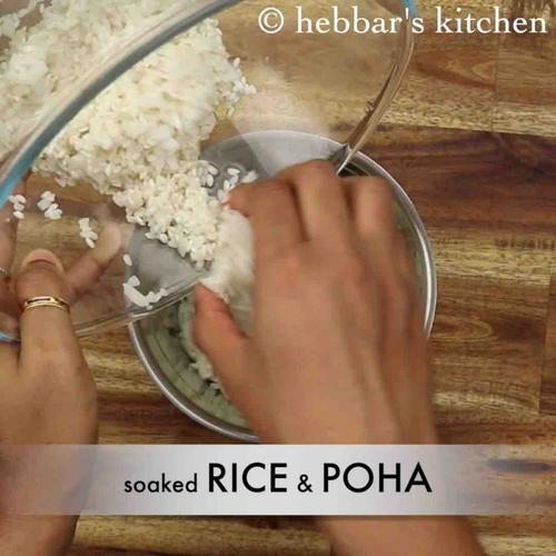 now transfer the soaked rice and poha into the blender.