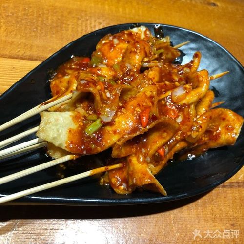 小木屋米酒店火辣鱼饼串图片